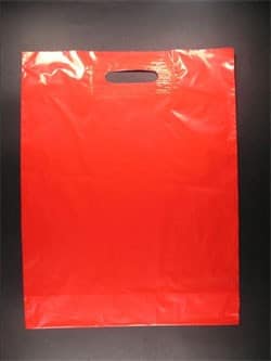 Sac plastique poignées découpées rouge 51µ 35x45+5 cm